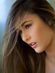 Bailey removes her flowery costume - Digital Desire